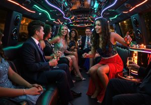 students in a prom limo