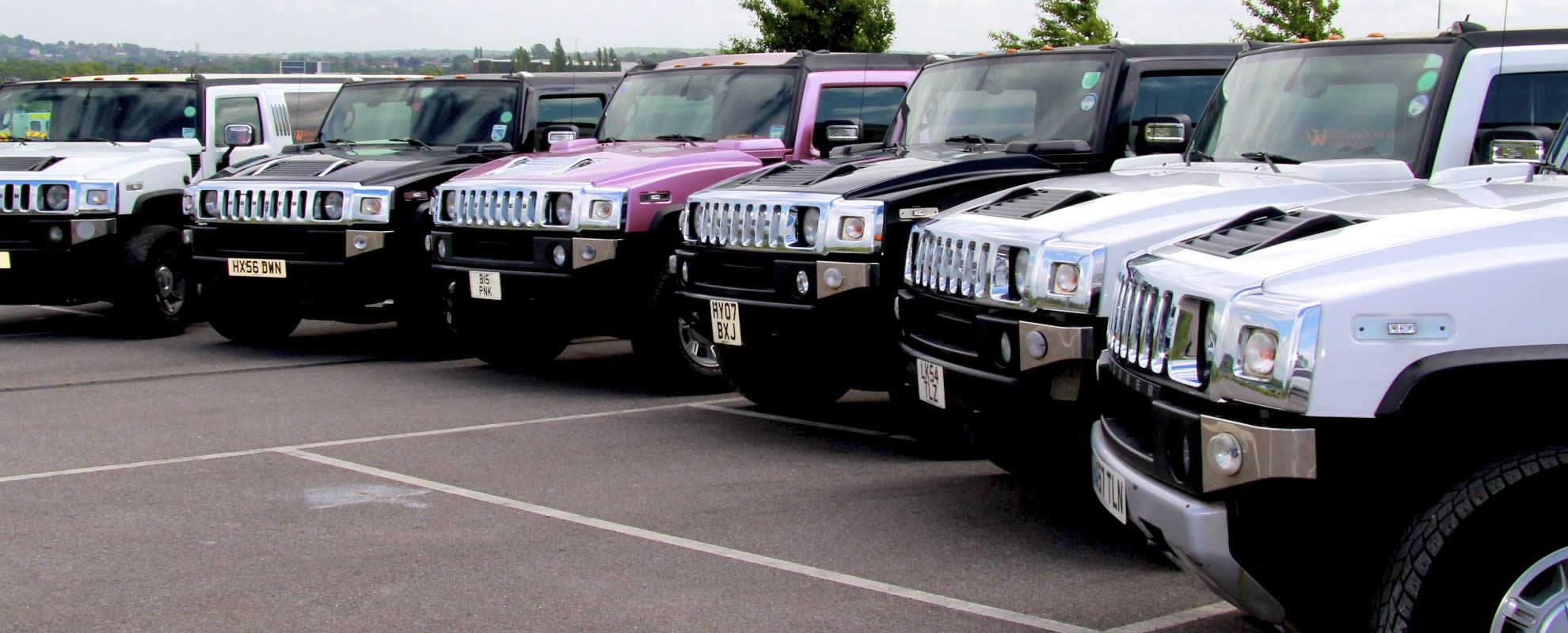 Lineup of Hummer Stretch Limos