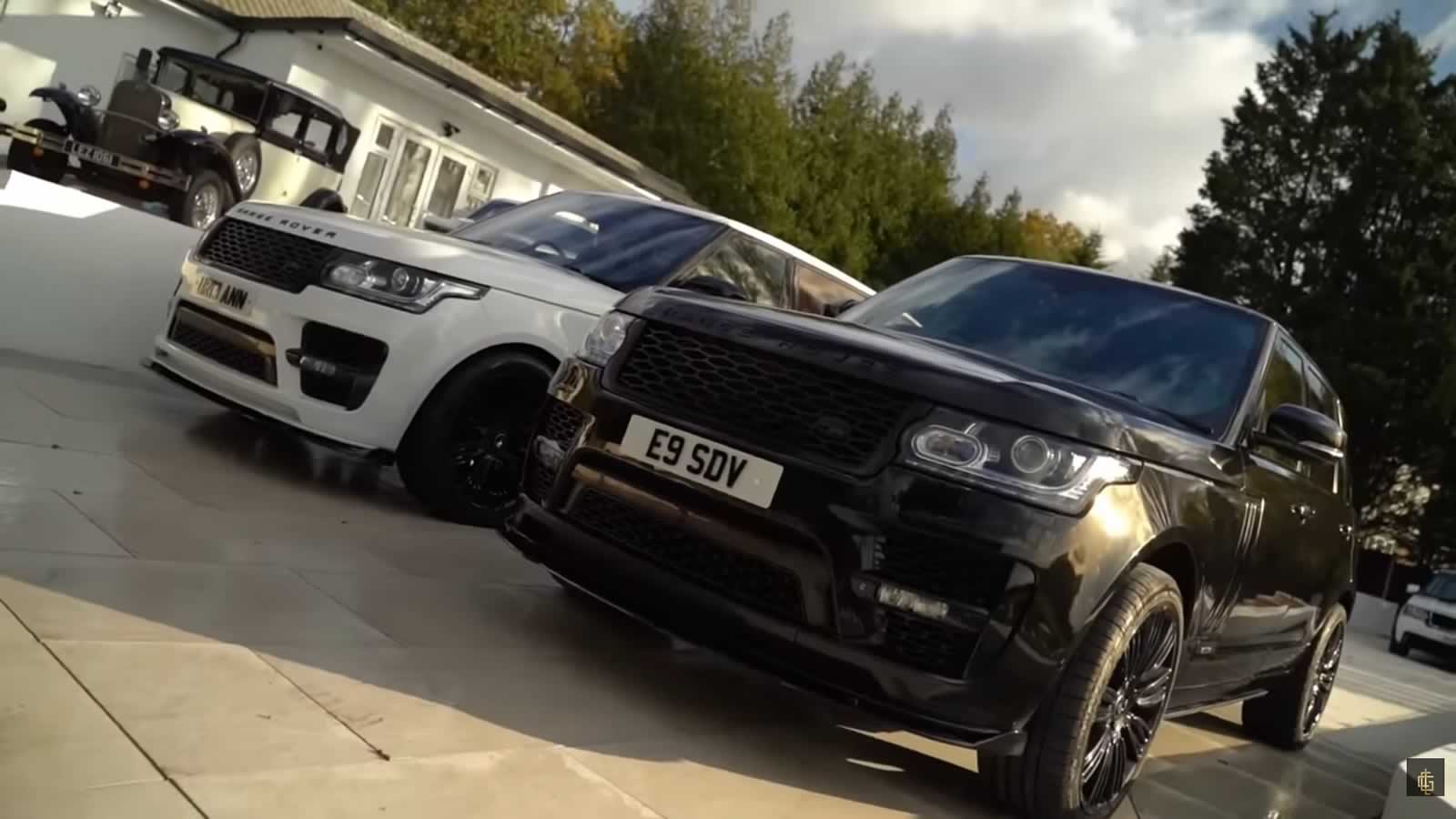 Two Range Rovers in black and white