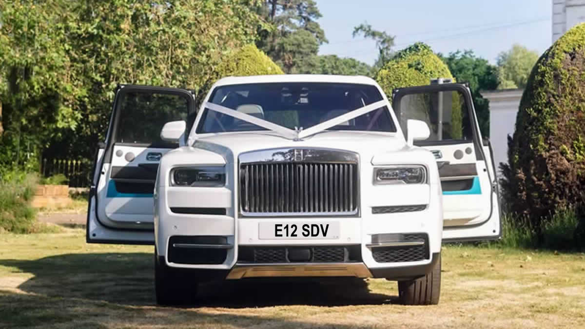 White Rolls Royce Cullinan SUV wedding car