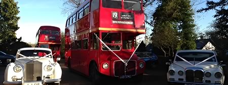 London Routemaster red wedding bus with ribbons plus two classic wedding car hires